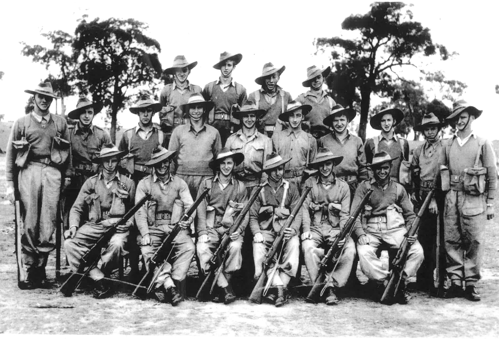 National Service approx. 1956: The Donald boys, back row, left to right, Jack Sweeny, ??, Ken Richards, Russell Hose. Middle row: Alan Wood, ??, Kevin Carne, ??, H Templar. Graeme Lang, ??, Noel Whelan, Ernie Munro, ??. Front: Stuart McNally, F. Armstrong, Alan Sands, Brian Howley, G. Hines, Ron Henderson.