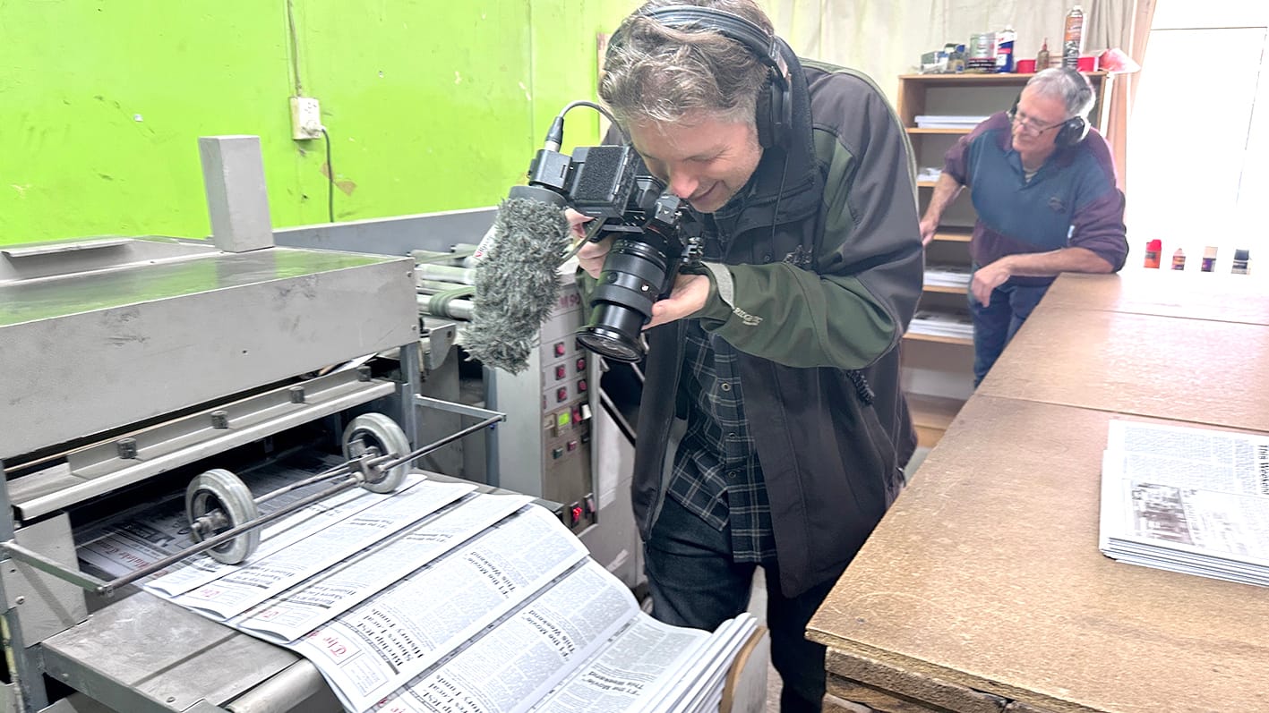 Andrew Alltree-Williams captures footage of the July 18 edition rolling from the folding machine.