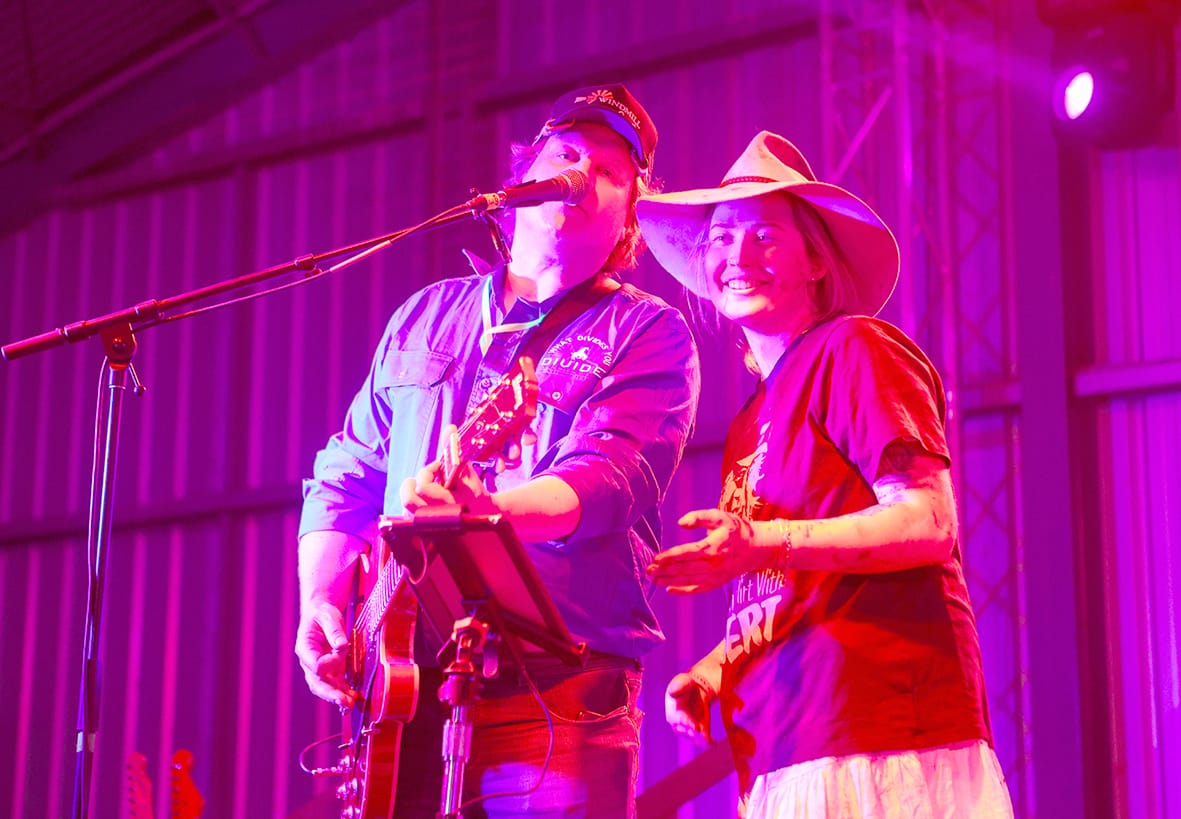 This fan got to sing on stage with “No Plans” musician, Bert, wearing a t-shirt featuring his face.