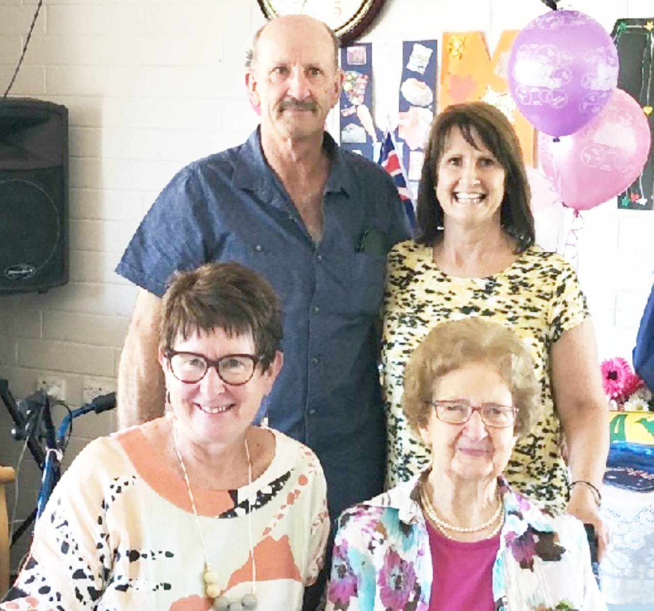 Rita Trollop and her three children, Laurie, Helen, and Robyn (seated).