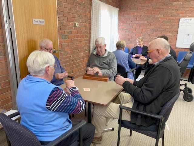 Nearest table, clockwise, Alma Tyson, Martin (Alan’s brother-in-law), Alan Dennis and Les Mellings. Furthest table, Margaret Hogan back to camera, Audrey Glen and Gail Frankling (partly obscured).