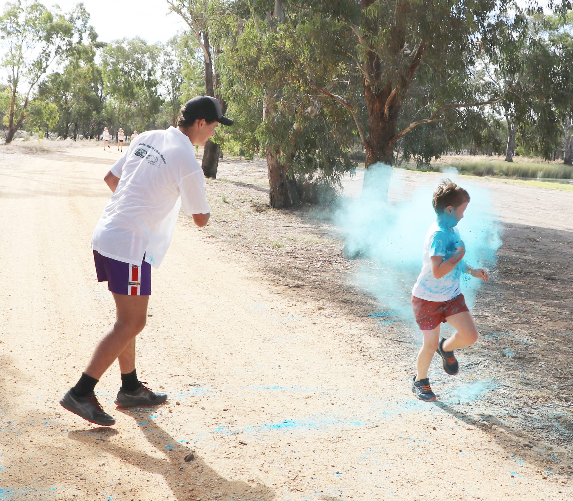 Youth Group member Patrick Sheahan colour bombing Jed Coffey who was first home,