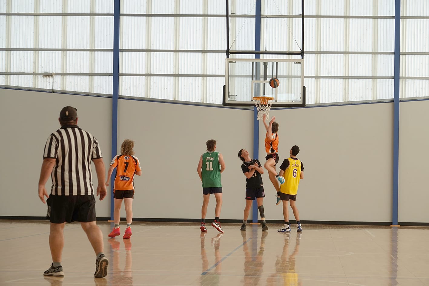Three-on-three basketball in the stadium on Friday afternoon. – Photo Jodie Drake.