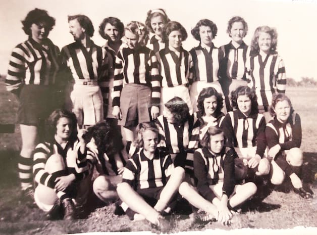 Birchip ladies’ 1950 football team, playing in black and white, in the Tyrrell league: Back row, left to right, Rona Bookham (Hogan), Roma Hogan (Thomas), Jan Bayles, ?, Janice Rickard (Douglas), Brenda McCredden (Hogan), Frances Brooks (Smith), Kath Shannon, Shirley Rogers. Middle row: Norma Blencowe (Rogers), ?, ?, ?, Claire Rogers (Hogan), Dot Atwell (captain-coach). Front: Wendy Peters, ?. Others who played were Aileen Hogan, Eileen Foott. Eileen lost an arm in an automobile accident, but was back playing the next season, and was still a great player, with one of the best kicks in the team.