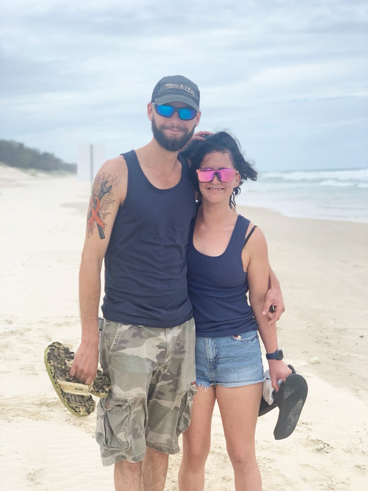 Keith and Hope Brusnahan checking out the Gold Coast’s not-so-sunny beaches. (Photo credit Sheree McQuilty)