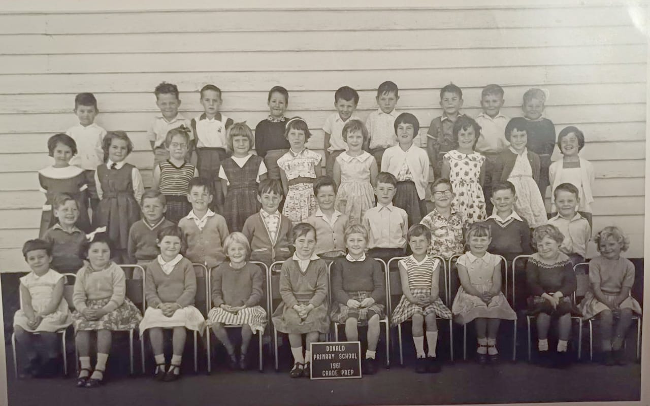 Donald Primary School Grade Prep, 1961: Back row, left to right, Stephen Bayles, Nick Pearse, Steven Tonkin, Robert Arnel, Rodney McKinnon, Wayne Burton, Philip Tonkin, Bruce Dunn, Wayne Decker. Third row: Pam Dunn, Glenda Basset, Lynette Trollop, Anne Baker, Judith Pearse, Rosemary Goldsmith, ??, Jenny Adams, Rae Cossens, Kerry Salmon. Second row: Garry Trollop, Sammy James, Shane O’Shea, Stephen Clipple/Craig Rothwell?, David Basset, Neville Barber, Ron Weaver, Peter Broughton, Shane Gallagher. Front: Kerry Vogel, Jenny Romeo, Virginia Anderson, Lexi Billingham, Deree Young, Dianne Wright, Glenda McCallum, Elaine Pearse, Lynette Broughton, Judy Rea.
