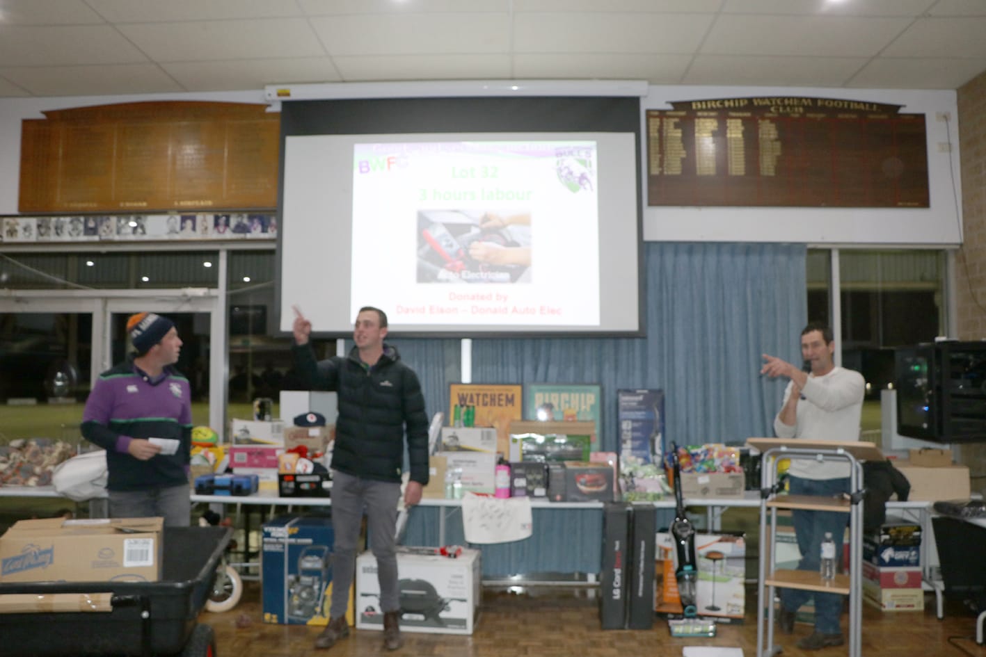 Matt Bailey and auctioneer Shan Coffey.