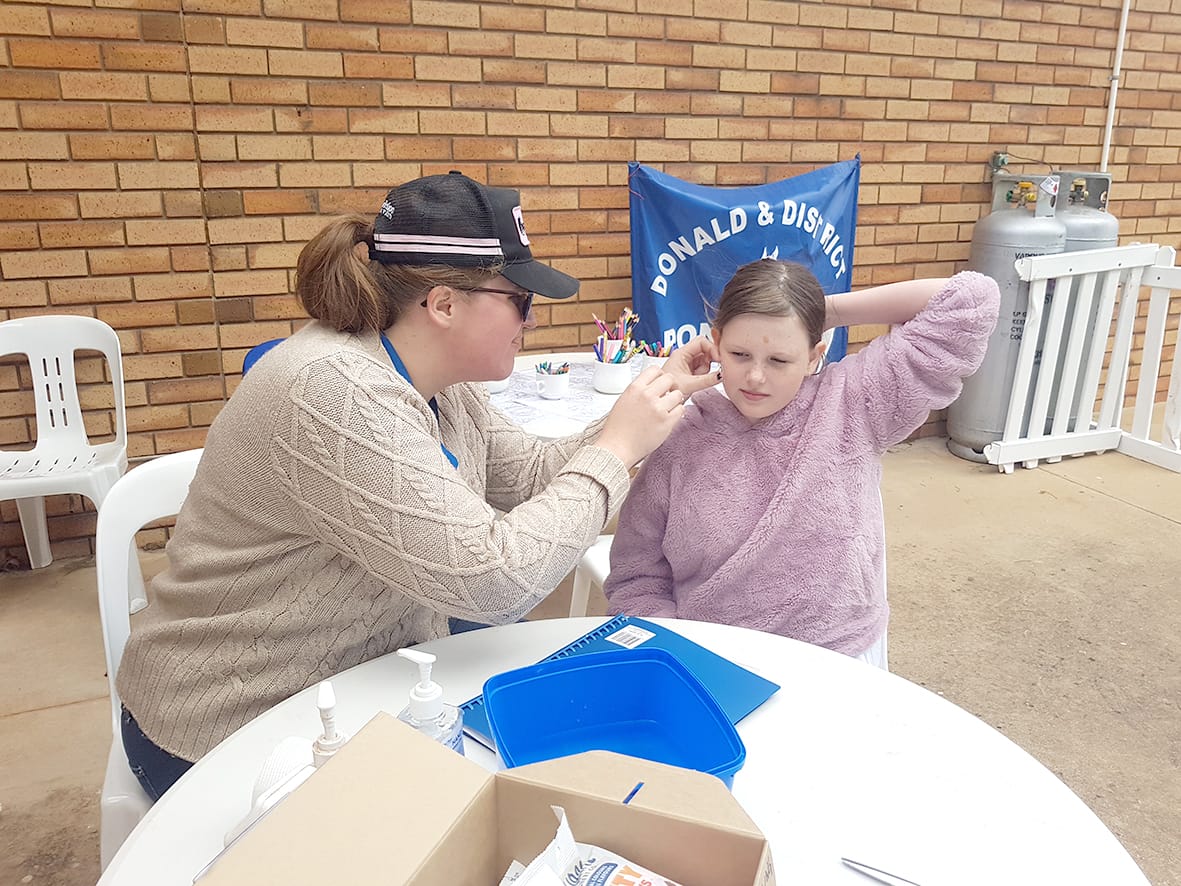 Representing the Donald and District Pony Club on Sunday was Melinda McEwen, placing one of many temporary tattoos on kids and adults on the day.