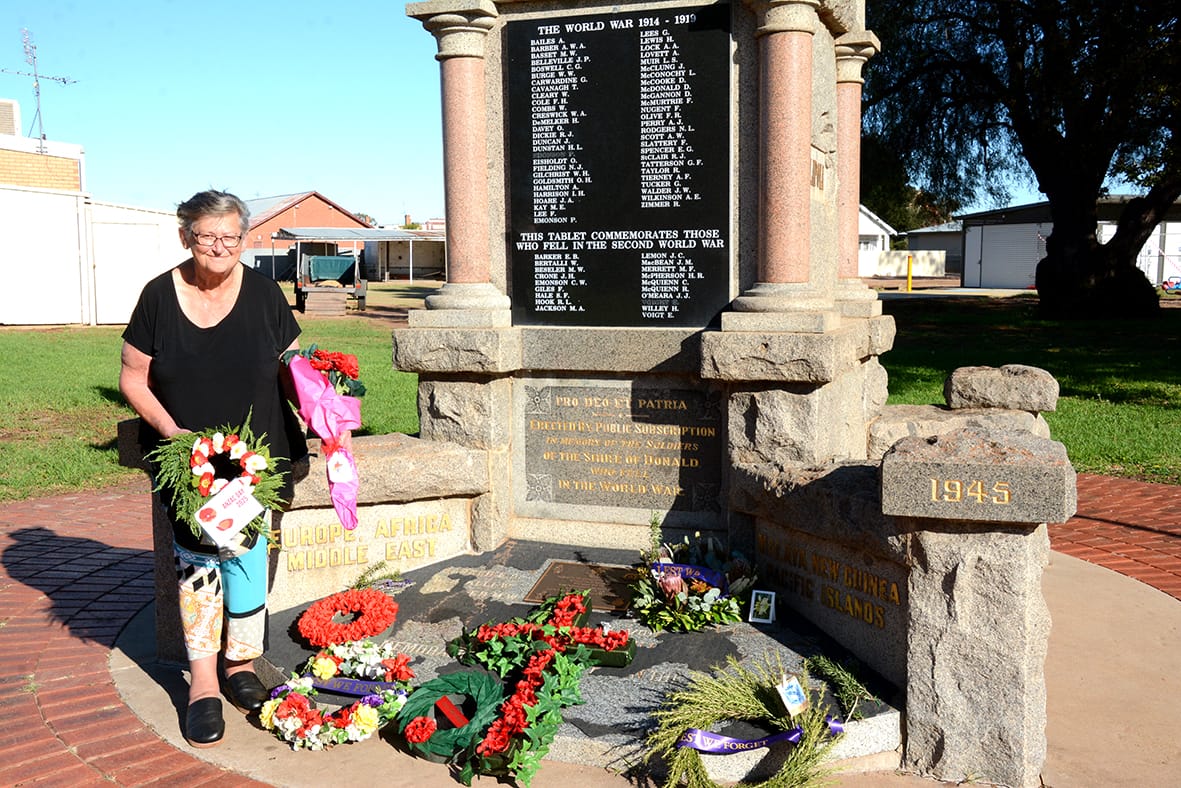 Donald RSL sub-branch president Carmel Dugan, with wreaths at the Donald Cenotaph on Sunday morning.