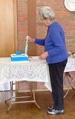 Cutting the Cake: Joan Wood.