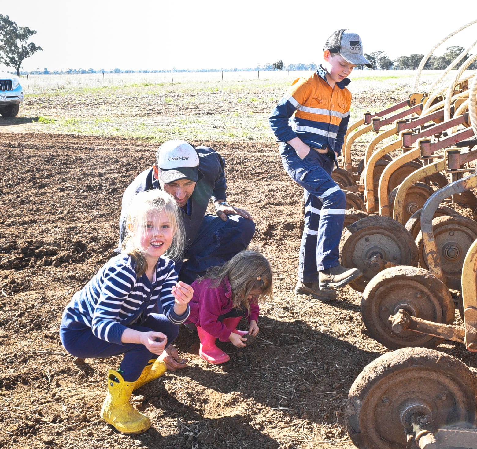 The great outdoors is a wonderful playground for the Riley family as they have a catch up at their Teddywaddy farm last Sunday. As their father Brad, was preparing to start cropping for the day the children shared some “exploration” time before the work got under way . Pictured left to right, are Brad, Dash (standing), Arie, Willow, Mum, Mel and Archer.