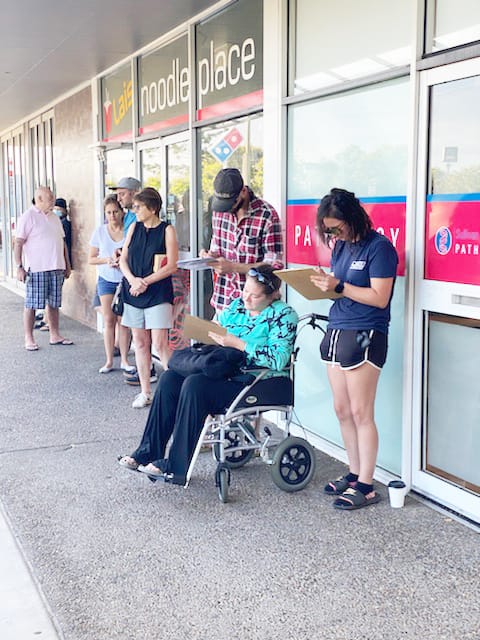 At 6.30 a.m. the line for COVID testing at the pathology clinic in Brisbane already stretched to the end of the building. (Photo credit Jason McQuilty)
