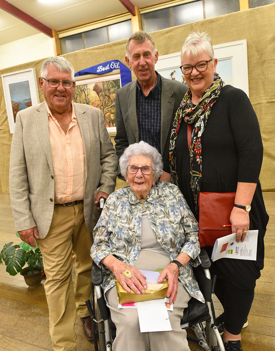 Mary Walklate (seated) was invited to officiate at the formal opening of the Exhibition. Pictured with Mary are (left to right) her sons, Ric and Phil, with Phil’s wife, Lisa.
