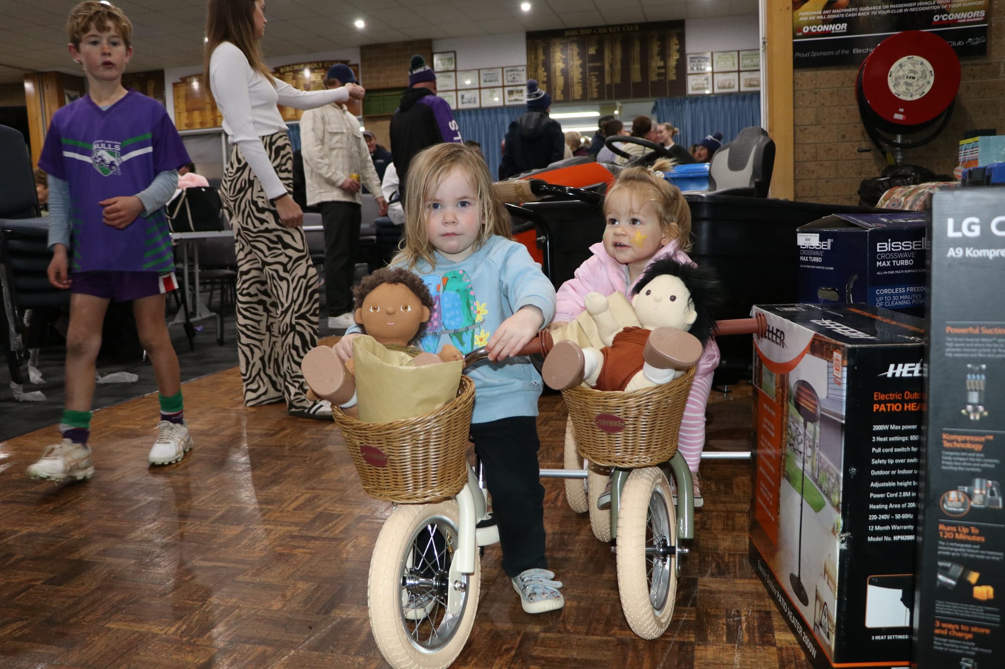 Tessa Noonan and Milly House testing out the Kawaii Kids donation.