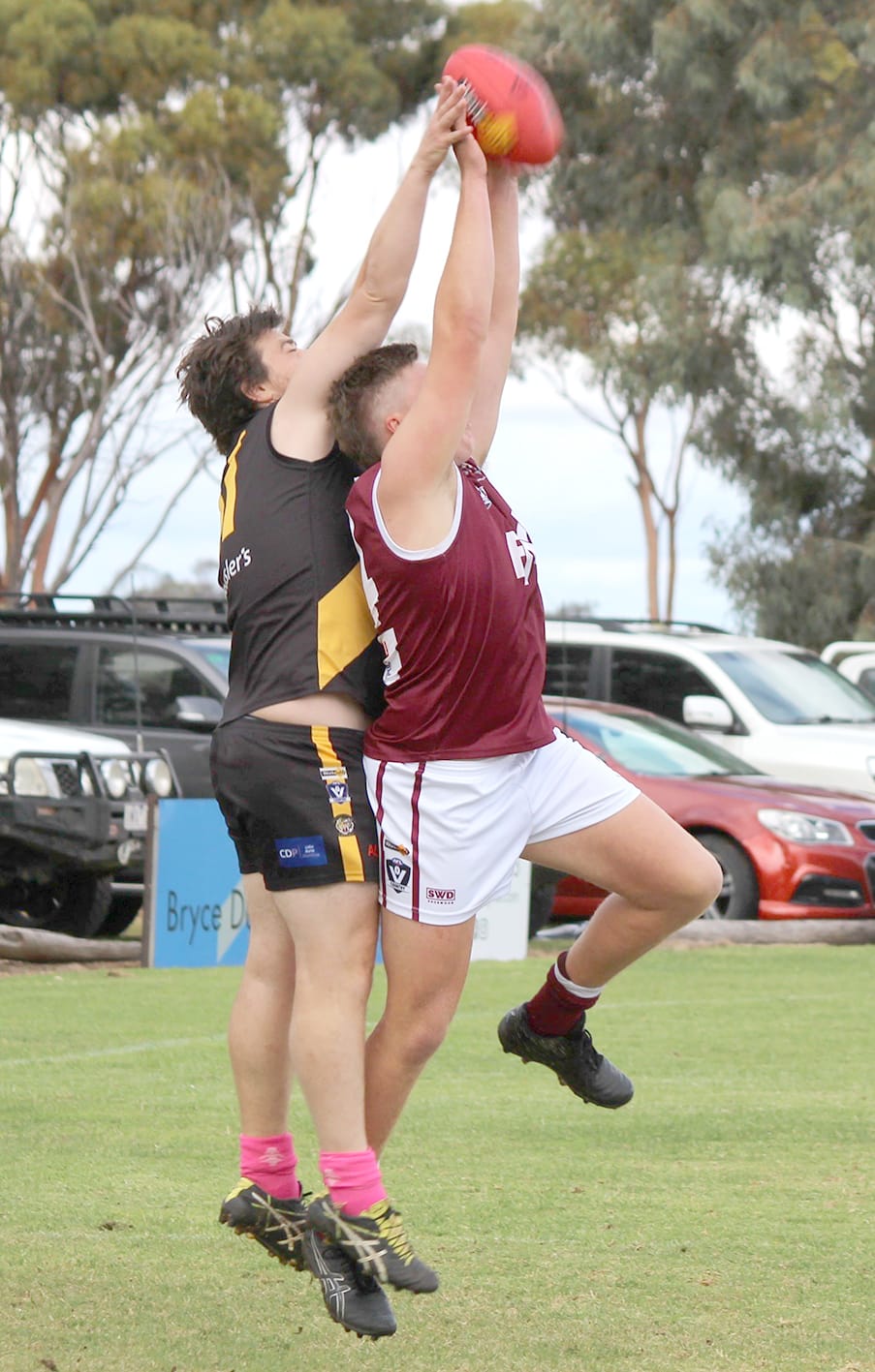 Nullawil reserves player Angus Forrester leaps to mark with the Tigers’ Harry Harcourt.
