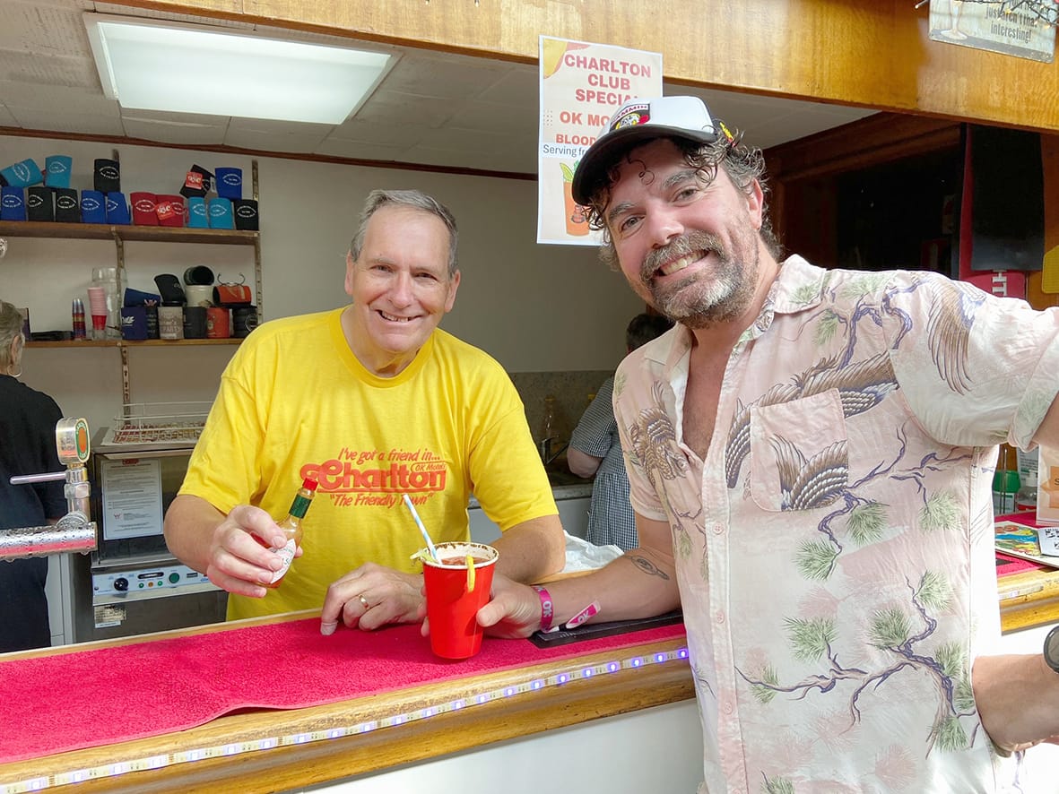 Charlton Club member, Markus Phillips (left), serves visitor, Nicholas Cooper, from Melbourne, with a Bloody Mary to start the day off.