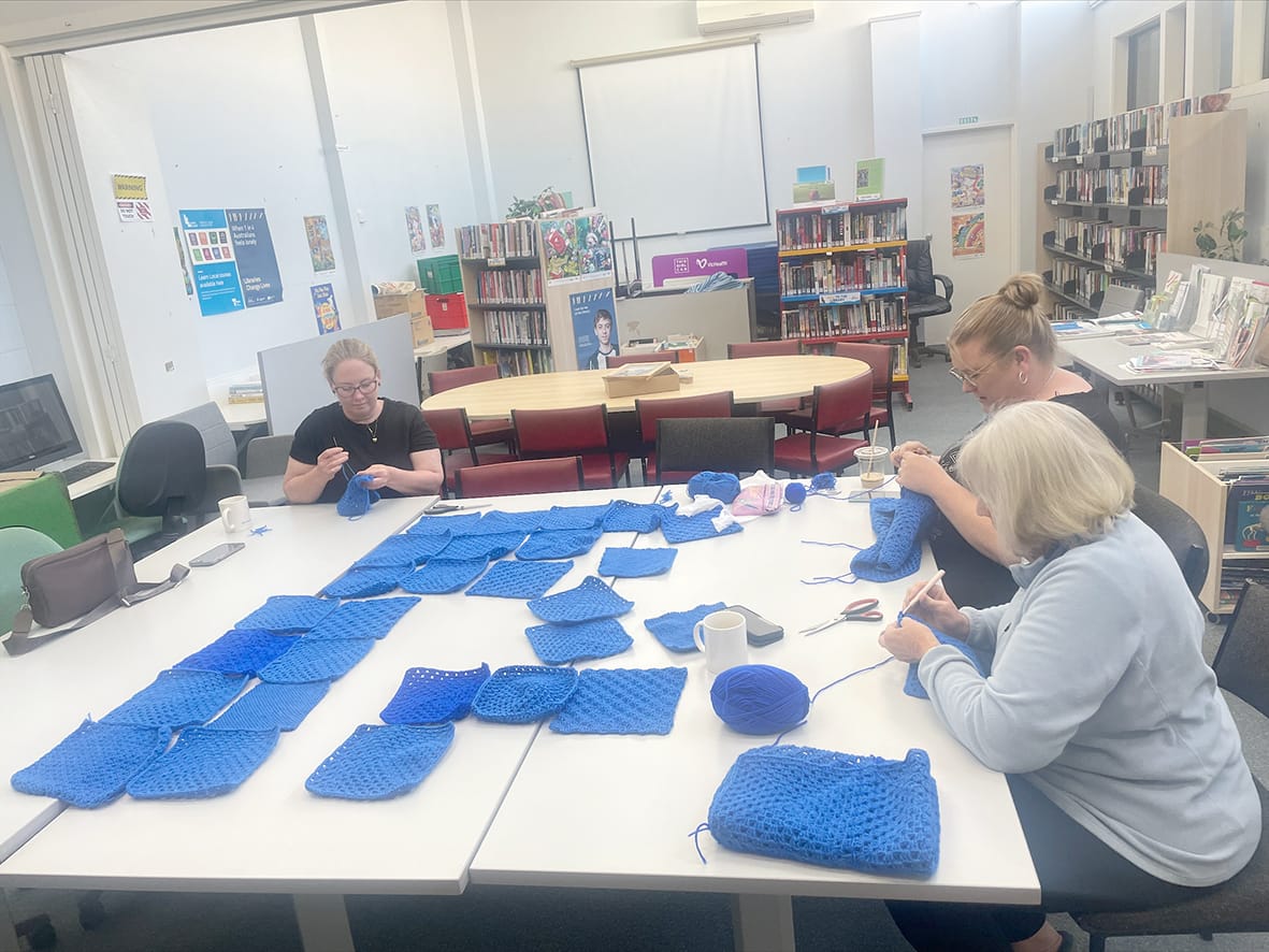 Crocheters in Wycheproof working on blues squares, left to right, Kirsten Morrison, Cheryl Cerrs, and Joy Morrison.