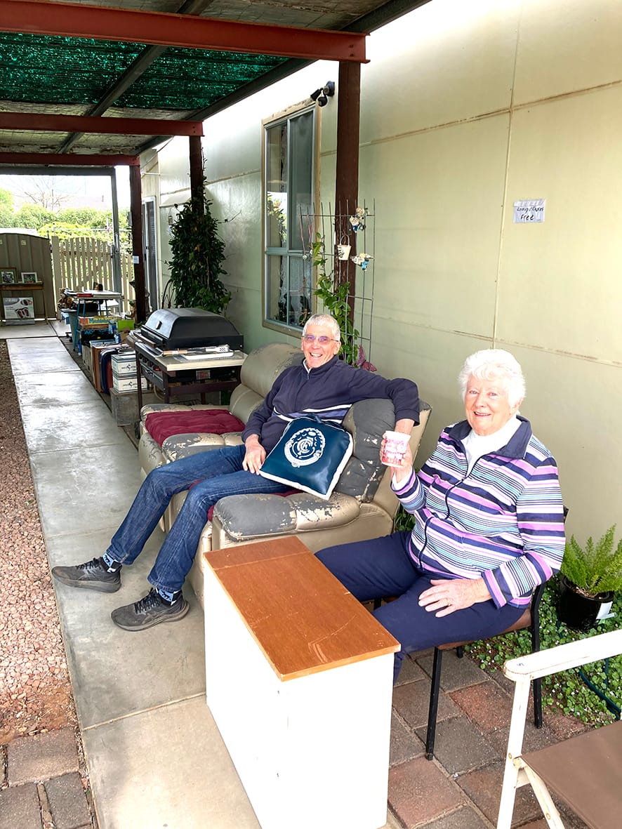 Donald’s Marion McEwen had help from her son, Bevan, in selling household items. Obviously unhappy by this season’s performance, Bevan was unloading his beloved Carlton football club cushion.