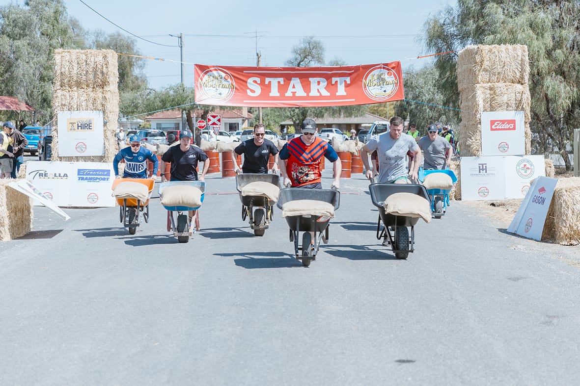 The start of the Men’s 60kg Wheelbarrow relay. (Photo by Laura Poyner.)