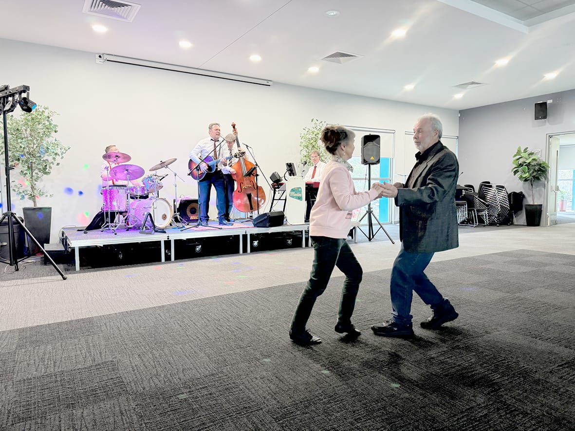 Aaron and Lauretta enjoying a spin on the dance floor.
